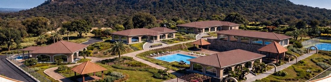 Aerial view of the Inara Retreats gated community, clubhouse and pool