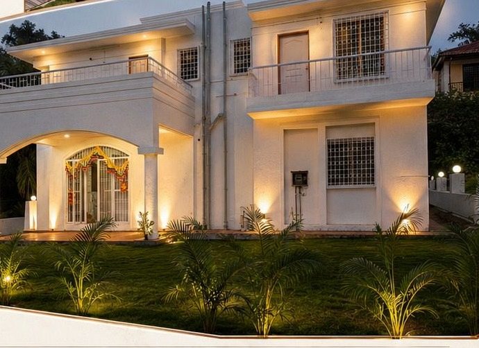 Front elevation of a ready 3-BHK bungalow at dusk